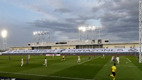 Real Madrid chose to use the empty stands at the Estadio Alfredo di Stefano to display a banner reading &quot;In our hearts&quot; paying tribute to coronavirus victims.