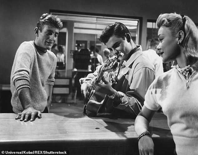 Film breakthrough: Saxon also starred alongside Sal Mineo in the musical comedy Rock, Pretty Baby in 1956; he is pictured with Rod McKuen and April Kent
