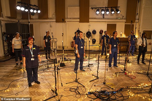 Tifful Nfull: The choir recorded a new song at London's iconic Abbey Road studio, in which Justin said: Let's share.  '