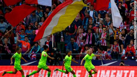 Barcelona forward Toni Duggan (R) celebrates during the Spanish league football match against Atletico.