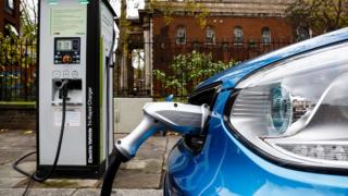 Electric car being charged on a London street