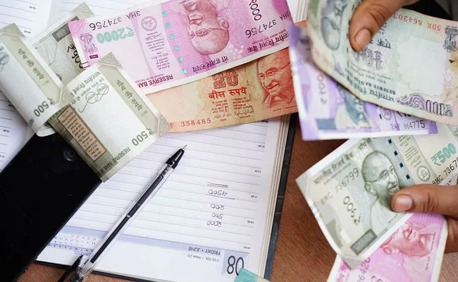 Rupee Edges Lower To 75.05 Against Dollar