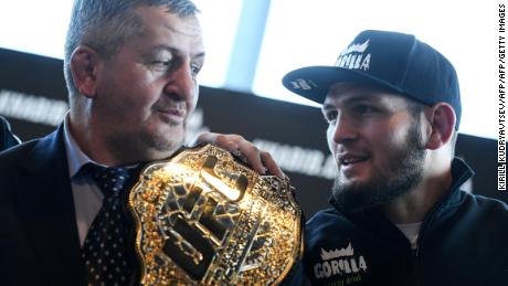 Mixed martial arts (MMA) fighter Khabib Nurmagomedov and and his father Abdulmanap Nurmagomedov give a press conference in Moscow on November 26, 2018.
