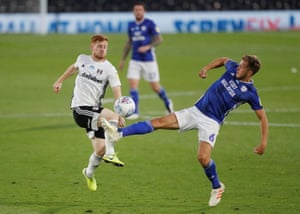 Fulham’s Harrison Reed (left) in action with Cardiff City’s Will Vaulks.