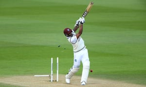 Mark Woo sends Shannon Gabriel’s stump and bails flying and the West Indies are all out for 318.