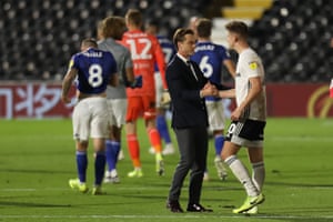 Fulham Manager Scott Parker congratulates Tom Cairney as they make the play-off final.