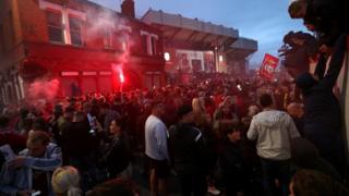 Fans gathered around Anfield