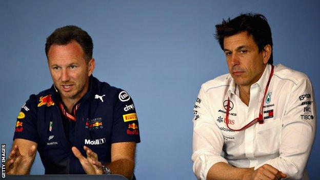 Red Bull team principal Christian Horner (left) and Mercedes F1 boss Toto Wolff (right) speaking at a news conference