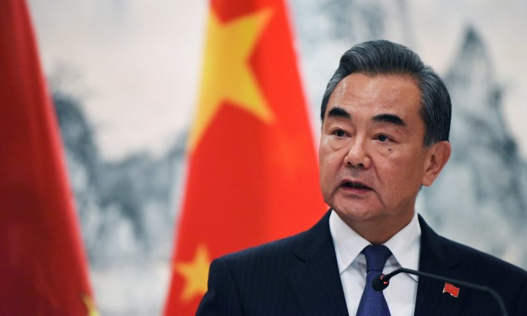 Top Chinese diplomats give conciliatory signals while demanding respect from the U.S.