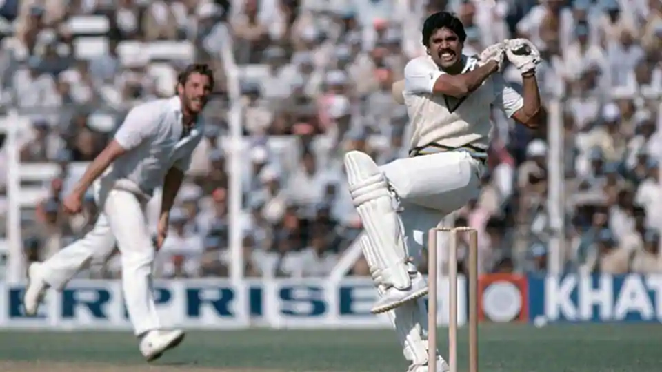 Kapil Dev pulls Ian Botham during a Test match between India and England at Wankhede Stadium in 1981.