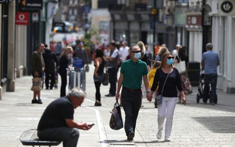 Embargoed to 0001 Monday July 13 File photo dated 14/06/20 of people walking along the High street in Winchester. Retail footfall for June more than halved against the same month last year as shopper demand remains low despite the "turning point" of reopening thousands more stores.