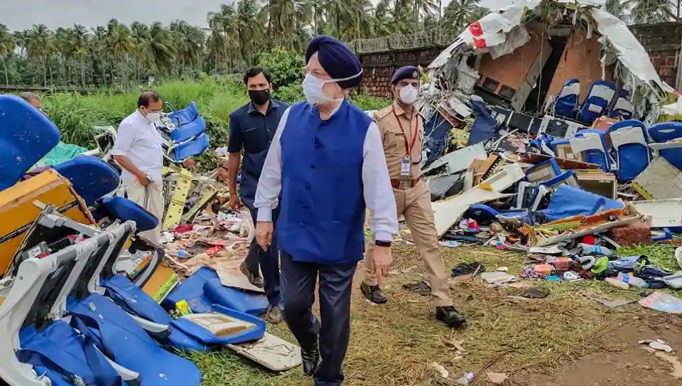 Union Civil Aviation Minister Hardeep Singh Puri inspects the crash site of an Air India Express flight in Kozhikode.