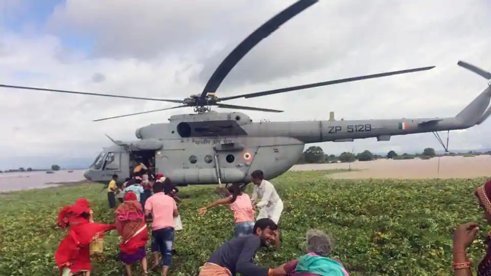 Indian Air Force airlifts flood-affected people in Sihor on Sunday. (ANI Photo)