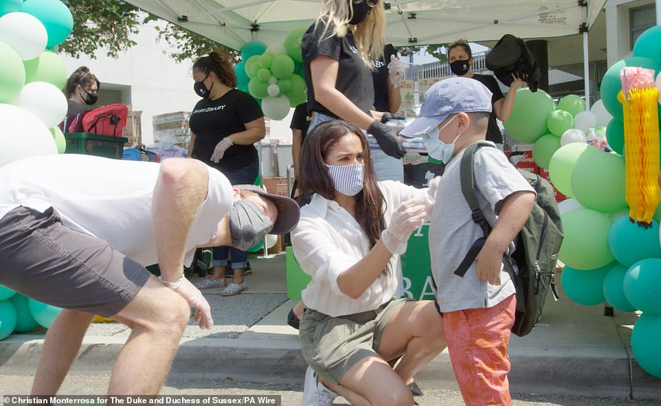 The Duke, 35, and Duchess of Sussex, 39 (pictured), volunteered at a back-to-school charity event in Los Angeles on Wednesday
