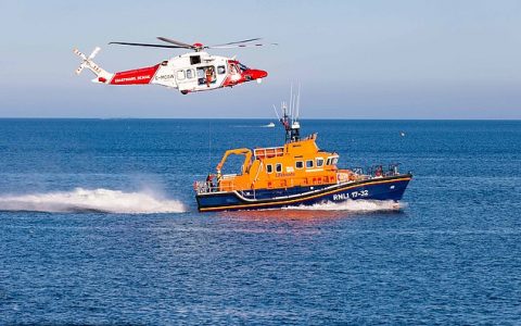 An RNLI life boat and helicopter in the English Channel (stock image)