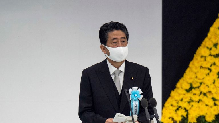Japanese Prime Minister Shinzo Abe delivers a speech during a memorial service in Tokyo
