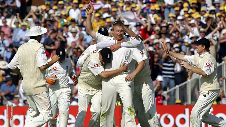 Manchester, United Kingdom: England players congratulate bowler Andrew Fl Flintoff (c) on August 12, 2005 after dismissing Australian batsman Simon Katich on the second day of the third Ashes Test at the old Trafford Cricket Ground in Manchester.