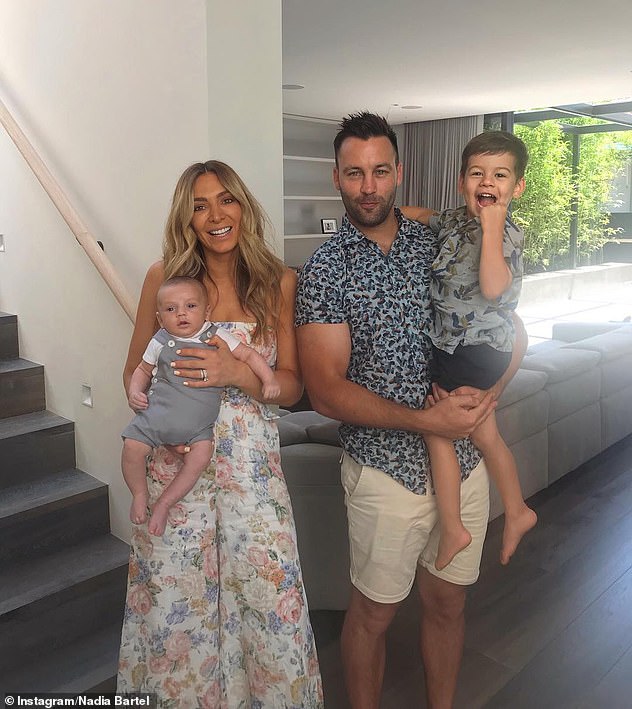 Over: The comments come after a difficult year for Nadia, who announced her breakup with her AFL star ex-husband Jimmy Bartell in August last year.  Picture with their sons in 2018