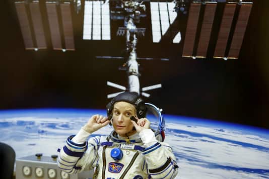 Kate Rubin, a member of the crew of the United States International Space Station (ISS), looks forward to donating a space suit.  Writers / File