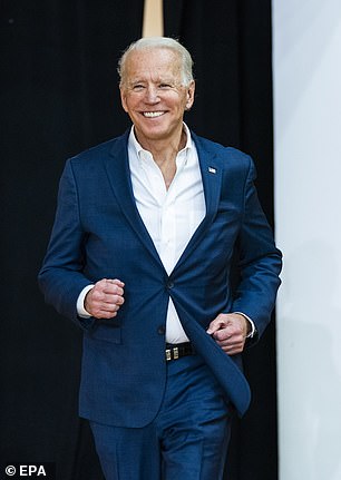 Getting closer: Joe Biden was on the verge of winning the presidential race on Friday morning when he overtook the battlefield states of Pennsylvania and Georgia in potentially crucial moments.