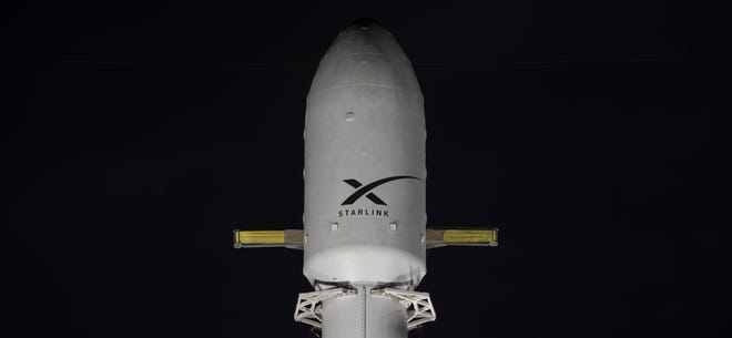 Space X Falcon 9 Rocket Fair with the company's Starlink logo.
