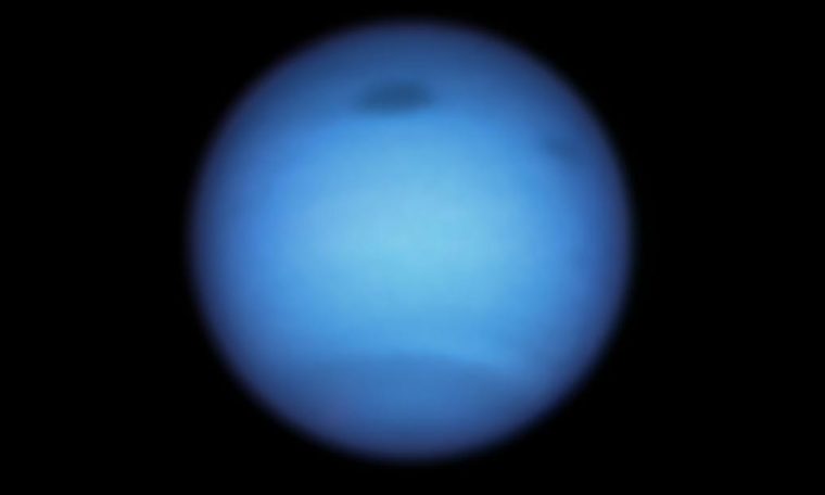 Hubble Neptune sees the big storm on the reverse course