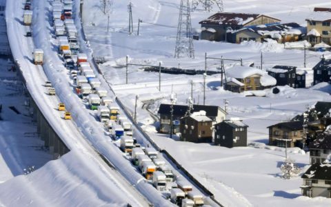 Blizzard in Japan: 9-mile traffic jam leaves 1,000 stranded overnight
