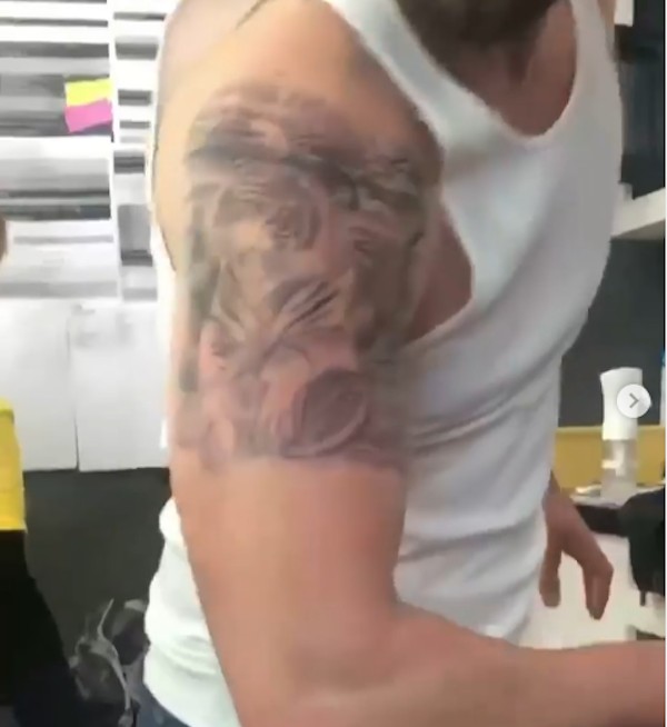 Justin Timberlake poses with fake tattoos on his arm (Photo: Instagram)