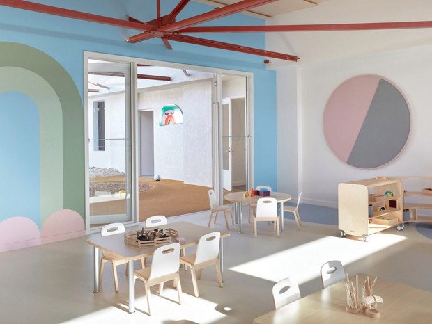 The school in Australia has a minimalist aesthetic marked by pastel colors and playful elements (Photo: Sean Fenness)