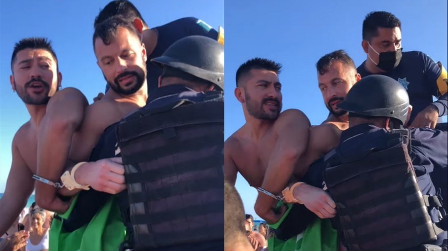 Gay men are arrested for kissing on the beach