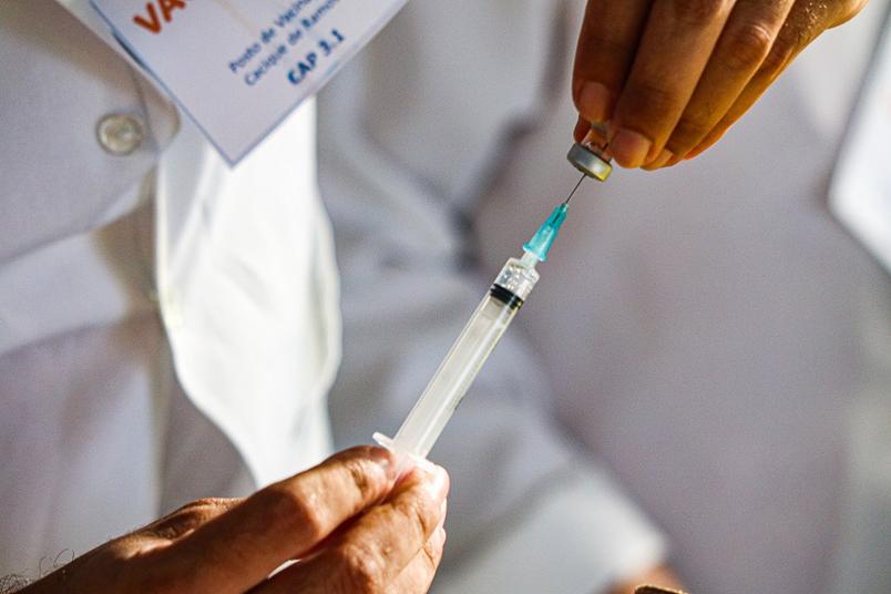 Health professional prepares vaccine supplements against coronovirus