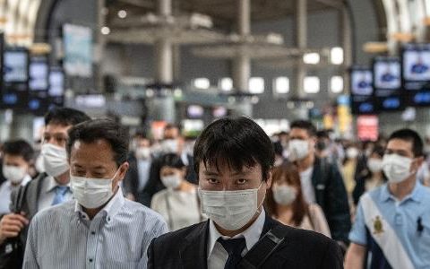 Japan extends virus emergencies to 3 more municipalities