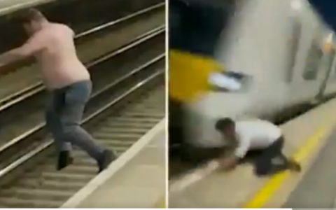 VIDEO: Drunk jumping on a London rail track shortly before a train passes.  world