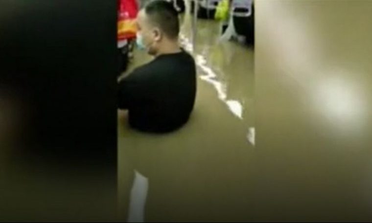 China floods: Commuters tell how they survived subway floods that killed 12