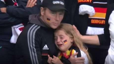 German girl caught crying on British television after the end of Germany