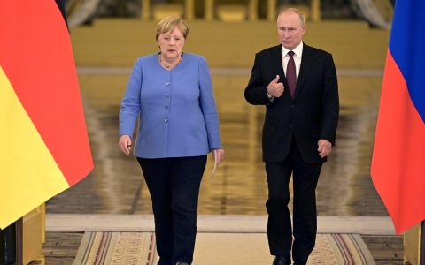 On her last visit to Russia as leader of Germany, Angela Merkel defends talks with Vladimir Putin.  World