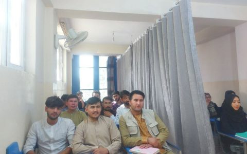 In Afghanistan, the back to school has a room separating men and women with curtains.  World