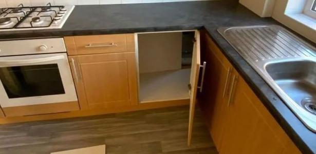 Couple found 'secret room' while opening kitchen cupboard