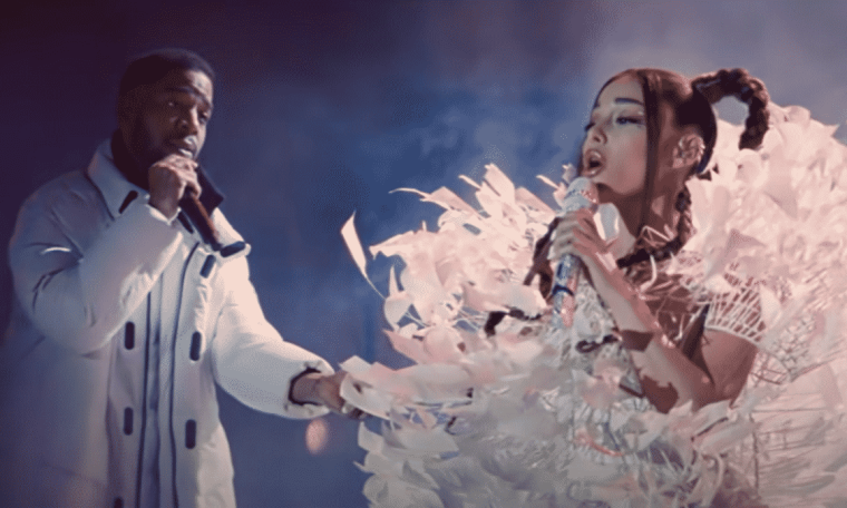 Ariana Grande and Kid Cudi sing 'Just Look Up' in a new scene