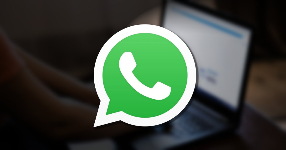 whatsapp icon with computer in background