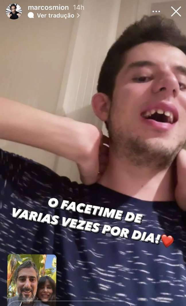 Marcos Mione and his wife make a video call with their son Romu.  
