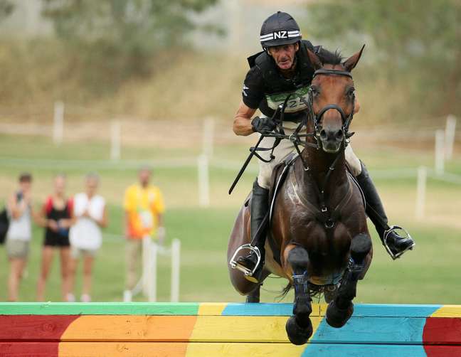 Two-time Olympic equestrian champion Mark Todd has been suspended after attacking a horse in training