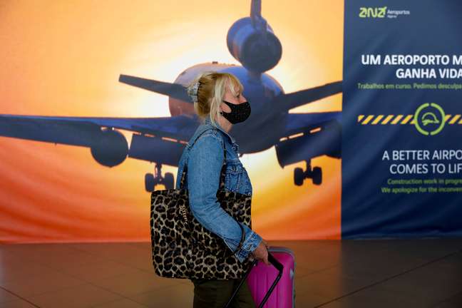 Woman arrives at Faro airport in Portugal 