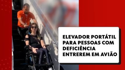 Business woman shows portable lift for disabled people to board the plane